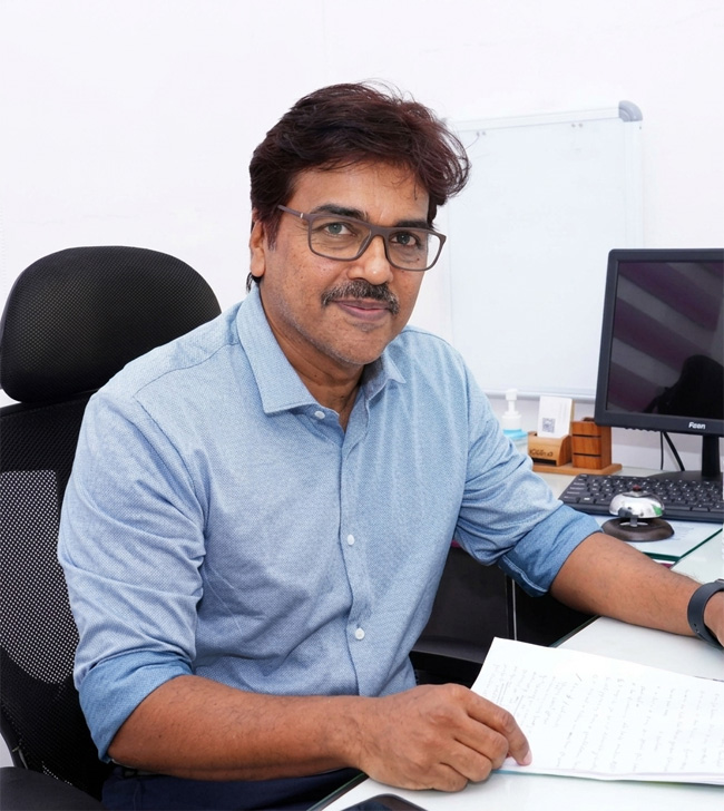 Dr. Charlie Cherian