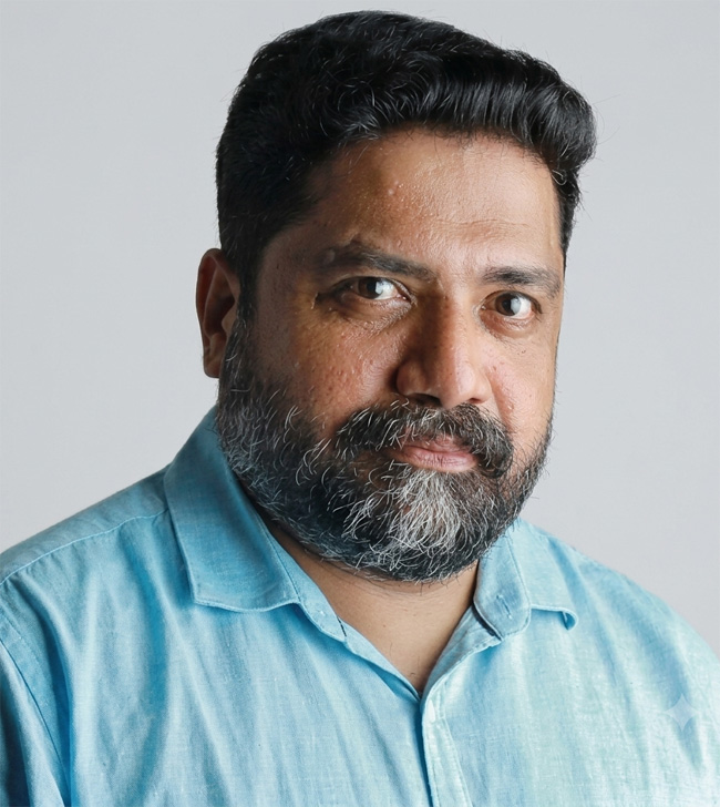 Dr. Kiran R